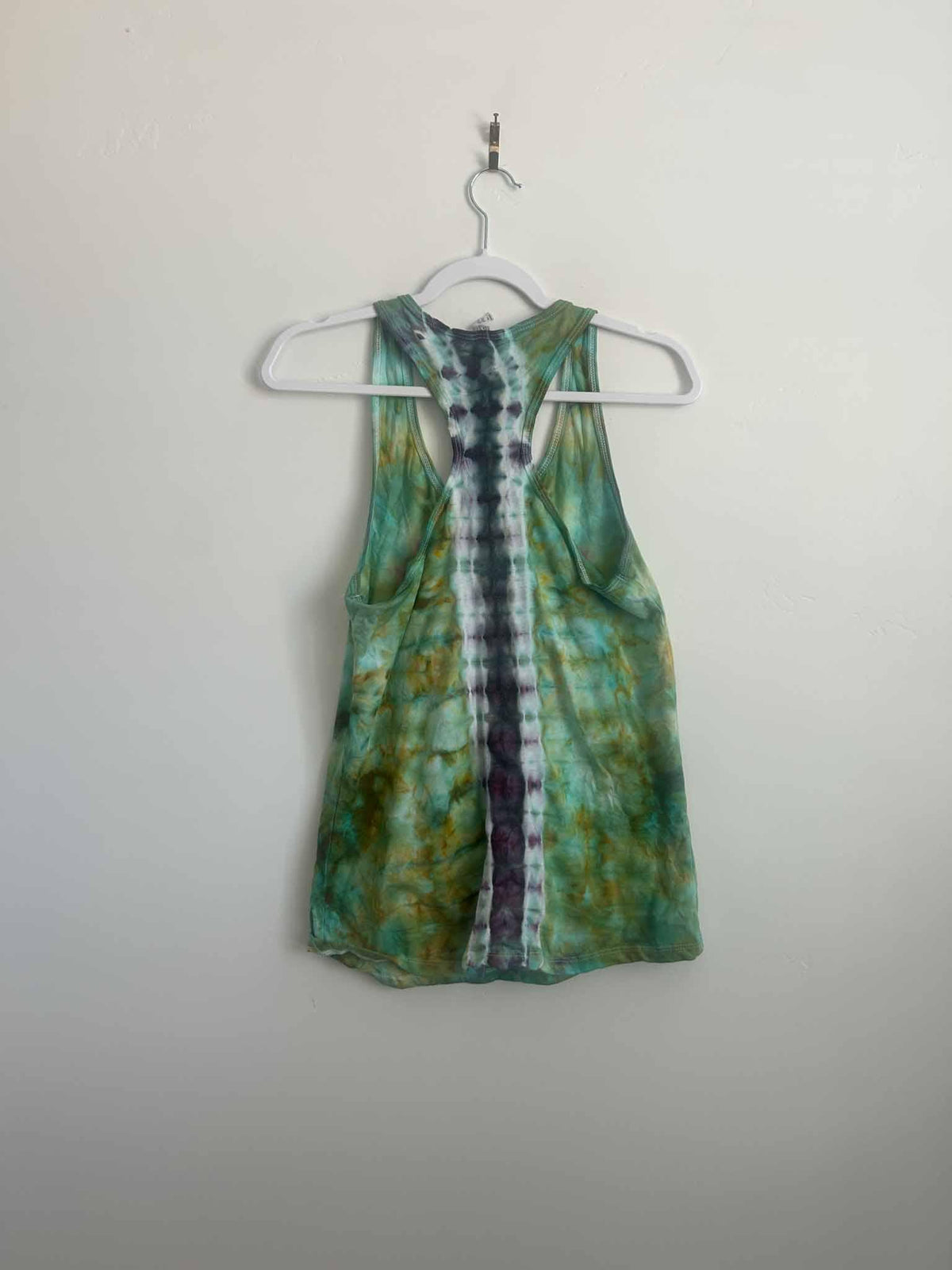 Ice dye tank top back view showing striped purple and black column detail