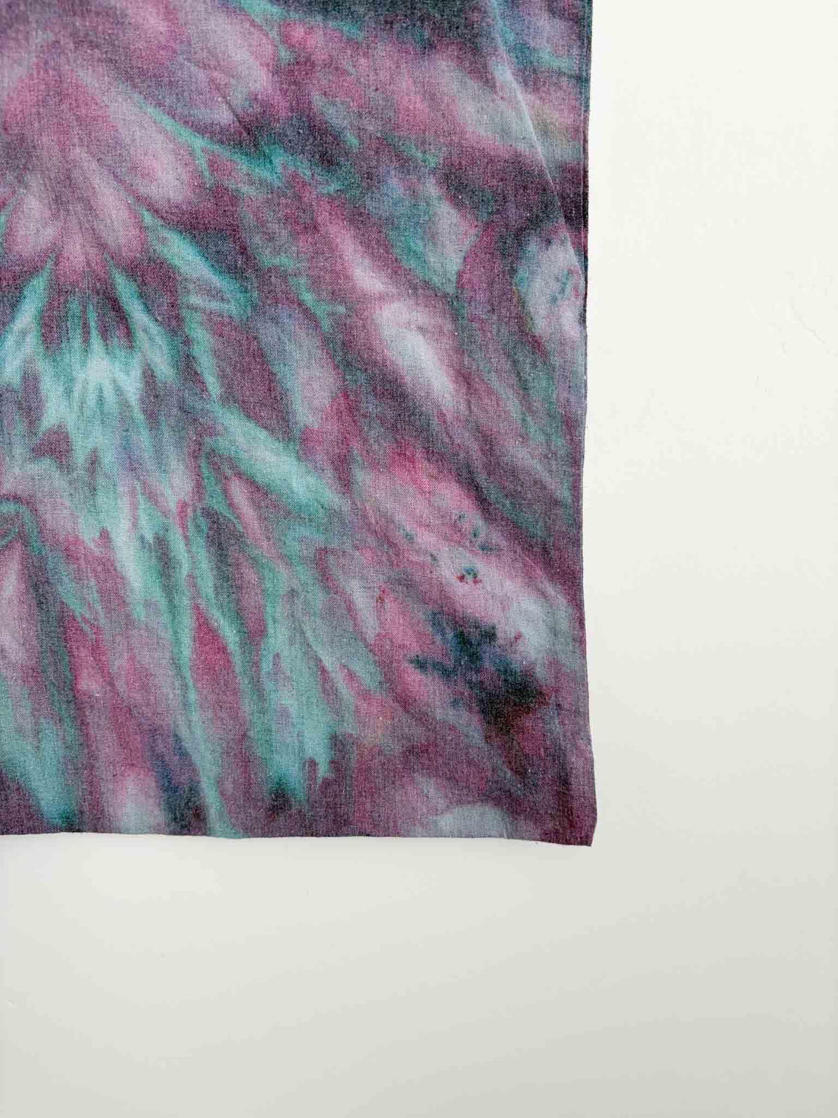 Close up of ice dye roll fold pattern on cotton canvas tote bag in magenta and teal tones __etsy:8361385188
