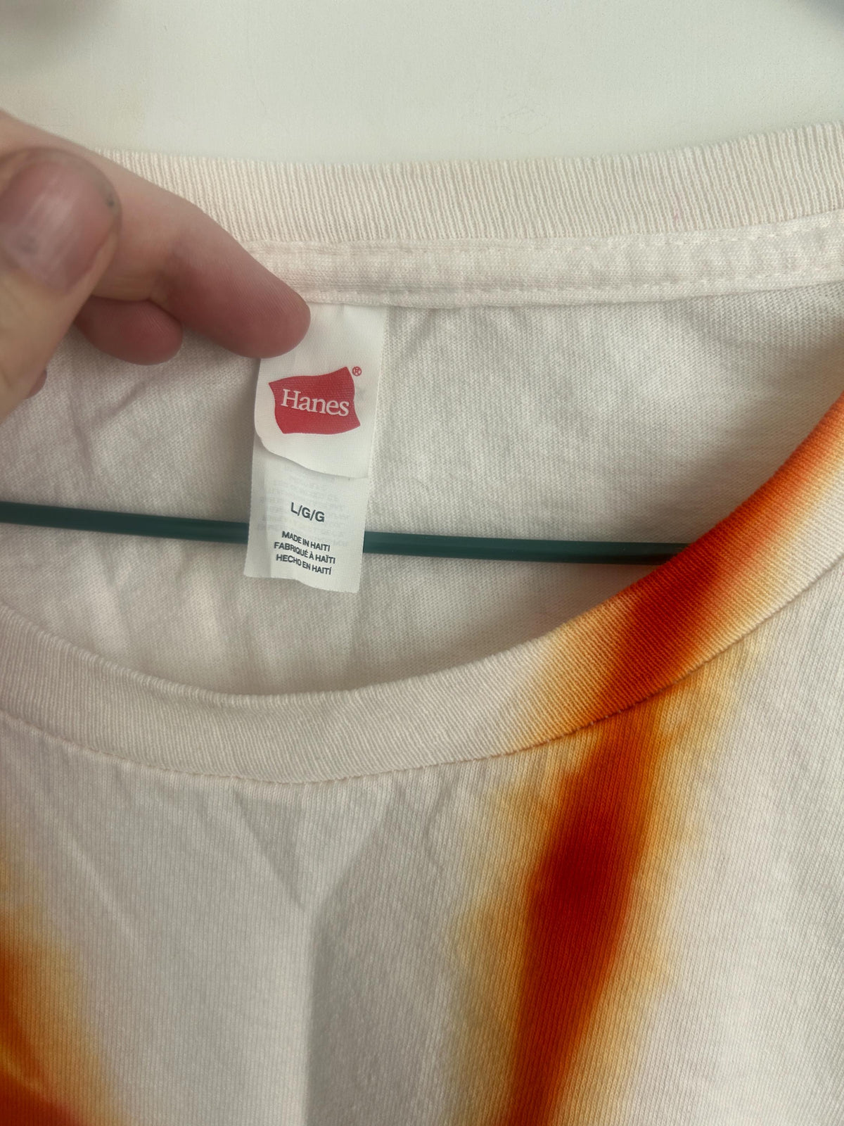 Close-up of Hanes size Large tag showing brand and size label __etsy:7967098929
