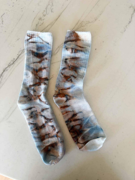 Pair of bamboo crew socks in rust and blue Pillars ice dye colorway laid flat __etsy:8501098128