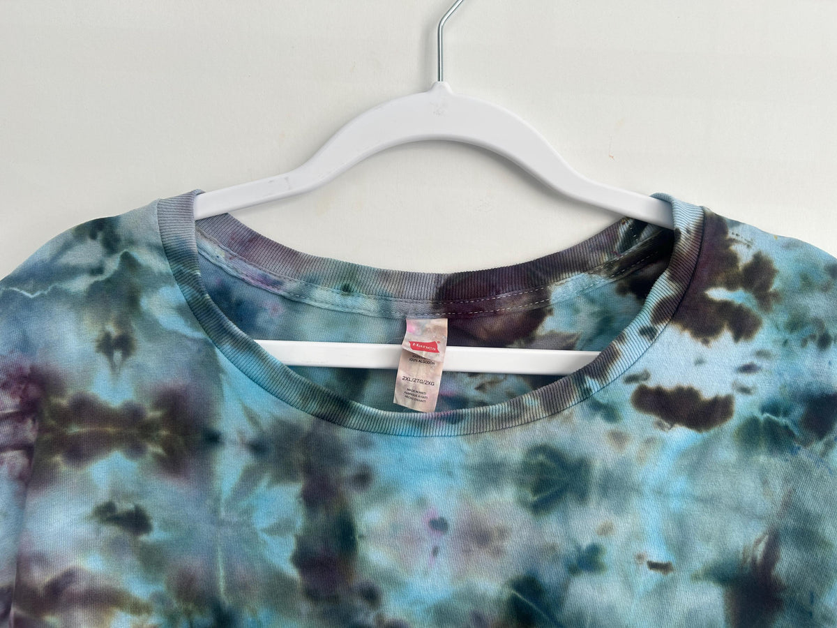 Collar and neckline detail of ice dyed tie dye shirt showing even dye coverage and handmade finish