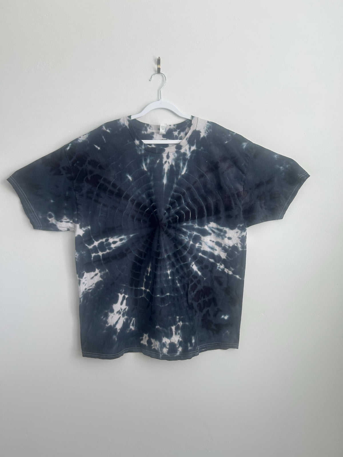 Hand dyed bullseye tie dye t-shirt in black and white, Hanes 2XL, front view