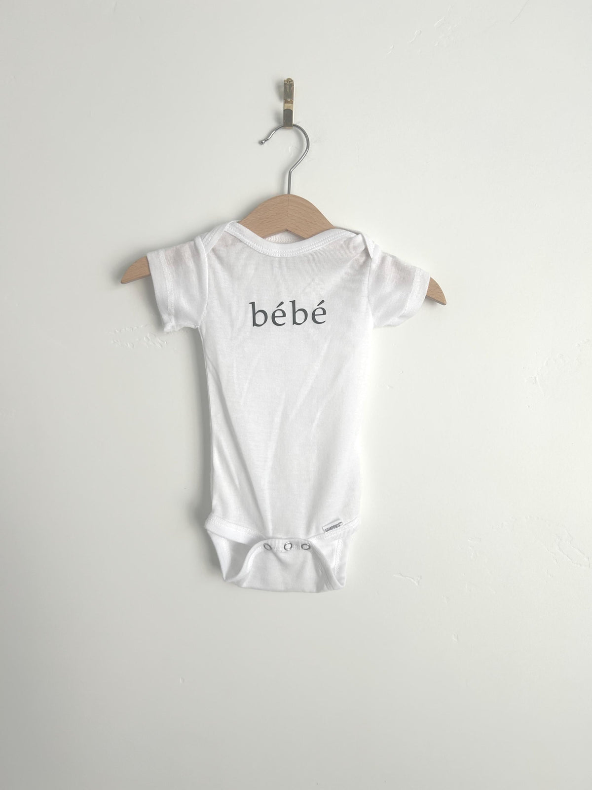3–6 Month Baby Onesie – “Bebé” Vinyl Lettering, White Gender Neutral Bodysuit