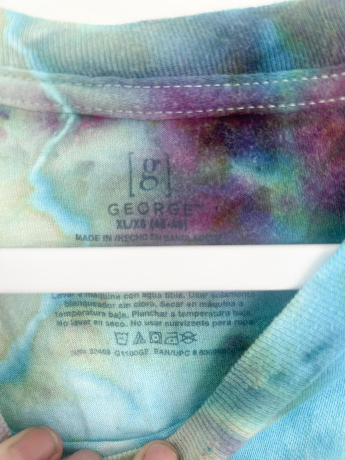 Close up of George brand label showing size XL 46 to 48 on hand dyed cotton t shirt