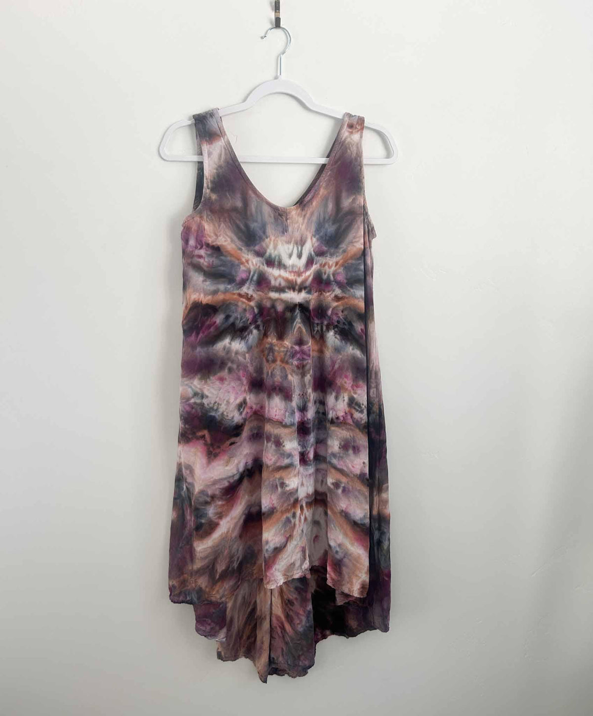 Ice dye hi-lo rayon dress in moody plum and grey, full back view on hanger