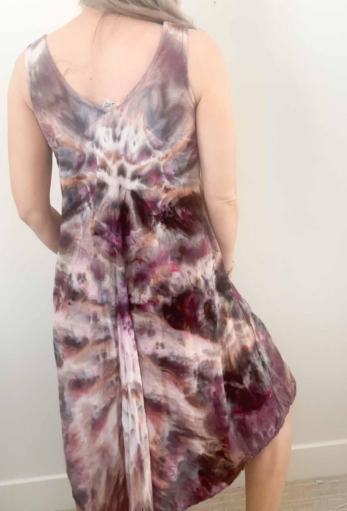 Dharma Trading Co. rayon hi-lo dress fit reference, back view on model showing hi-lo hem length