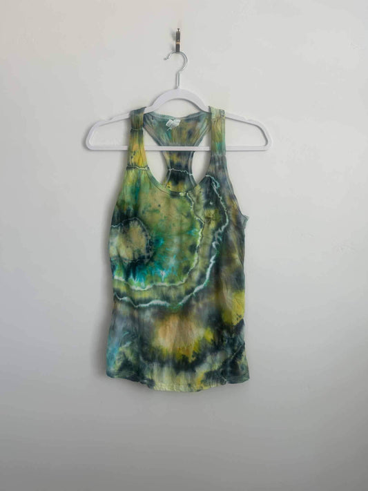 Ice dye geode tank top in green and gold, full front view on hanger
