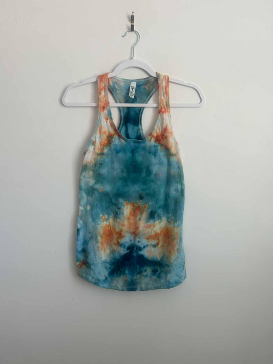 Ice dye mirror fold tank top in kingfisher blue and peach, full front view on hanger