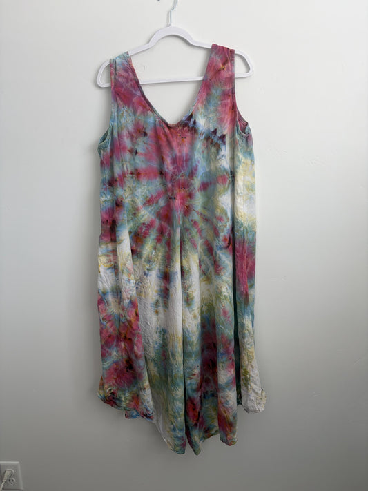 Full view of XL tie dye tank dress in rose, sage, and blue on hanger
