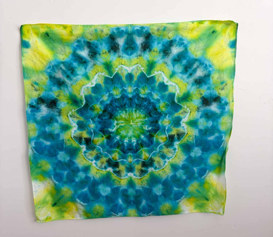 Green blue mandala tie dye bandana 22x22 inches, ice dye kaleidoscope pattern flat lay