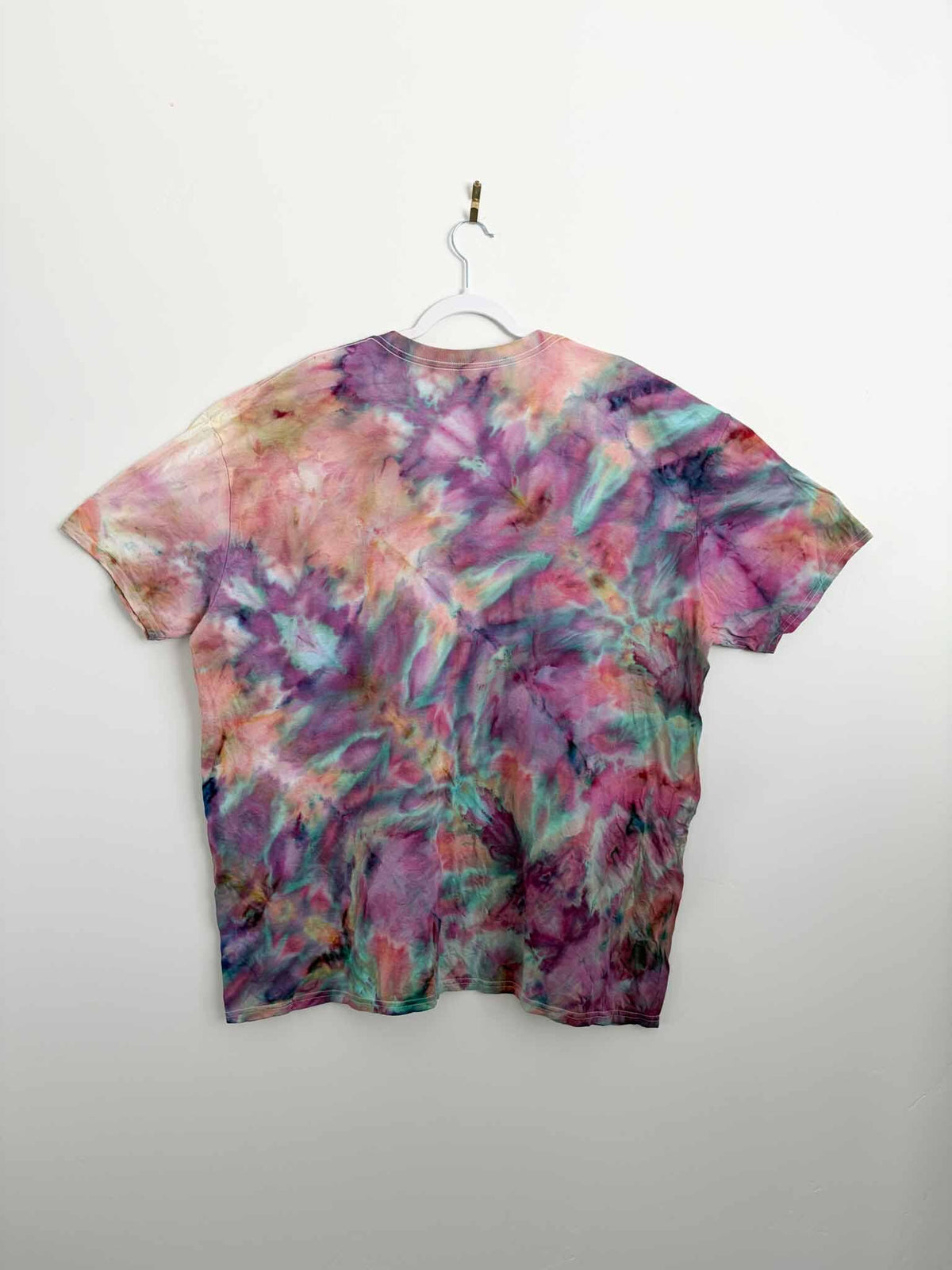 3XL pink and purple fern fold ice dye tie dye tee hanging, front view, handmade one of a kind