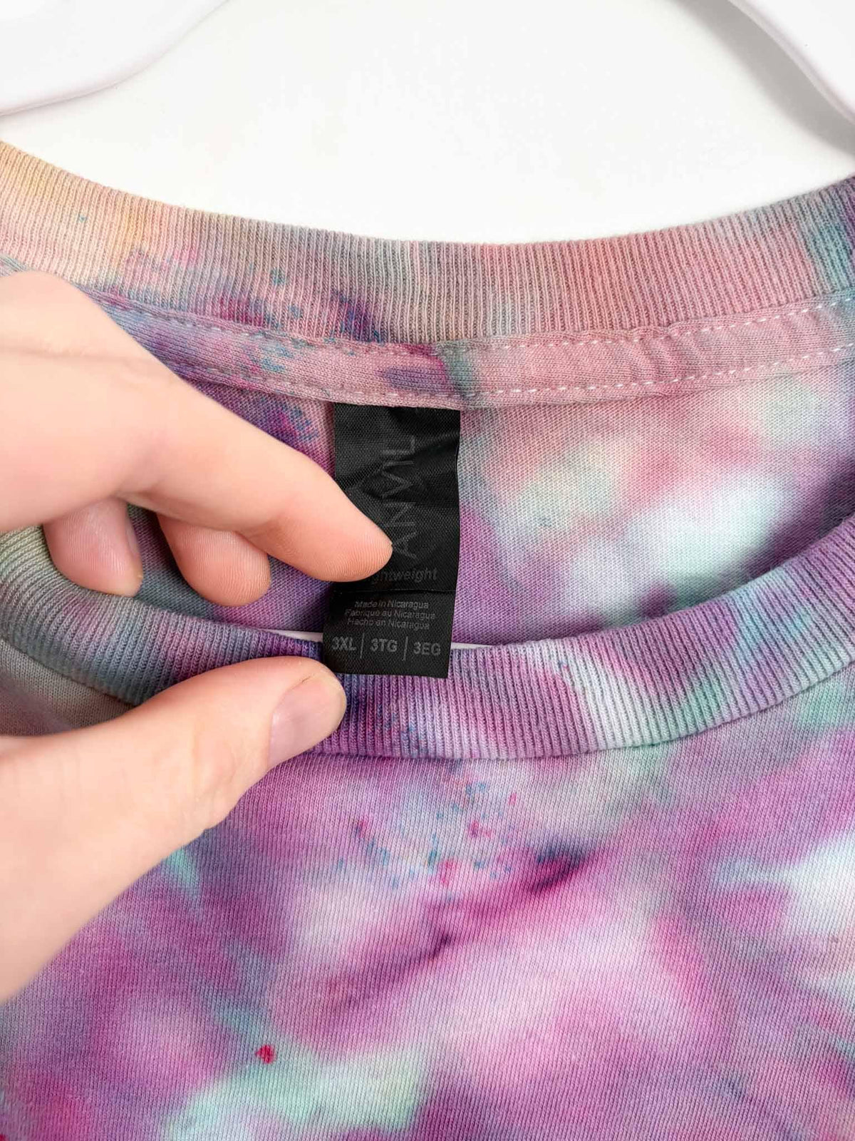 3XL tag on pink and purple fern fold ice dye tie dye tee