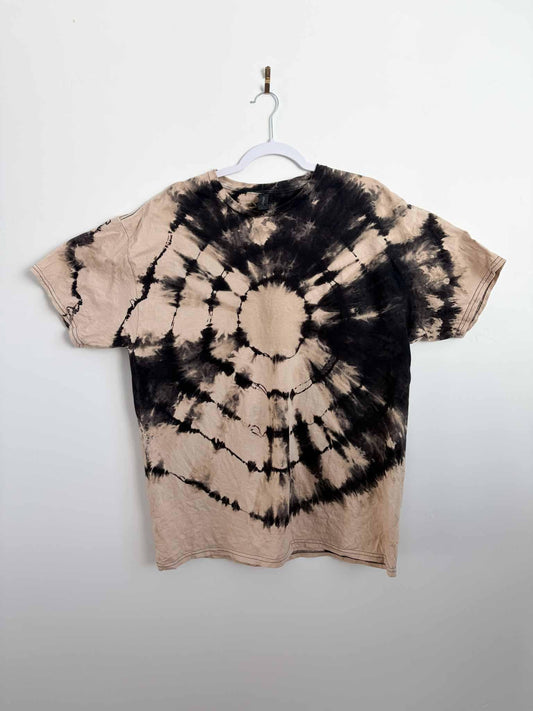 Front view of XL reverse tie dye bullseye shirt in black and tan