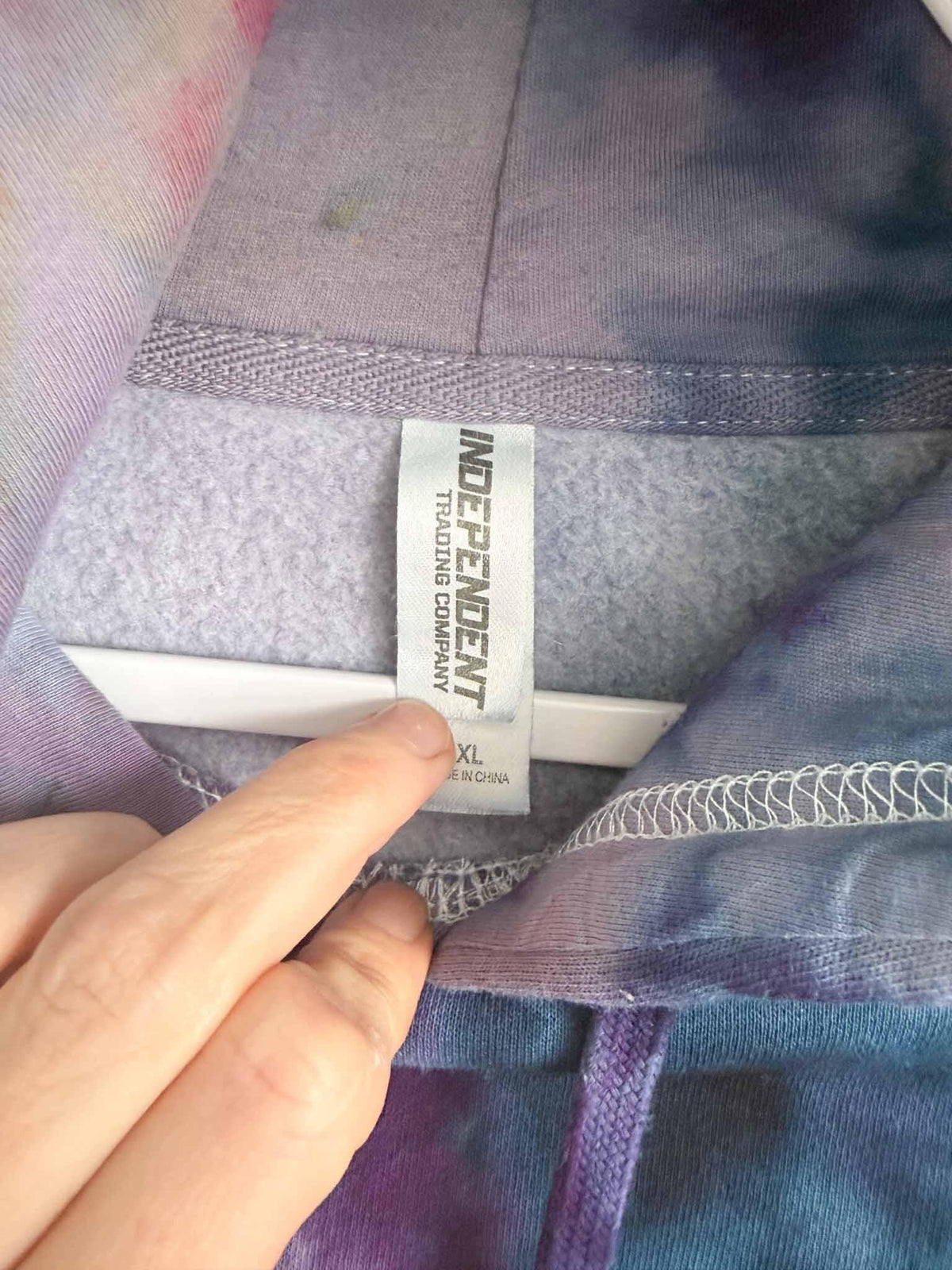 Independent Trading Company XL tag on purple and green ice dye tie dye hoodie
