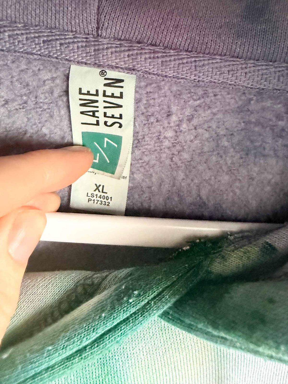 Lane Seven XL tag on purple and green ice dye tie dye hoodie