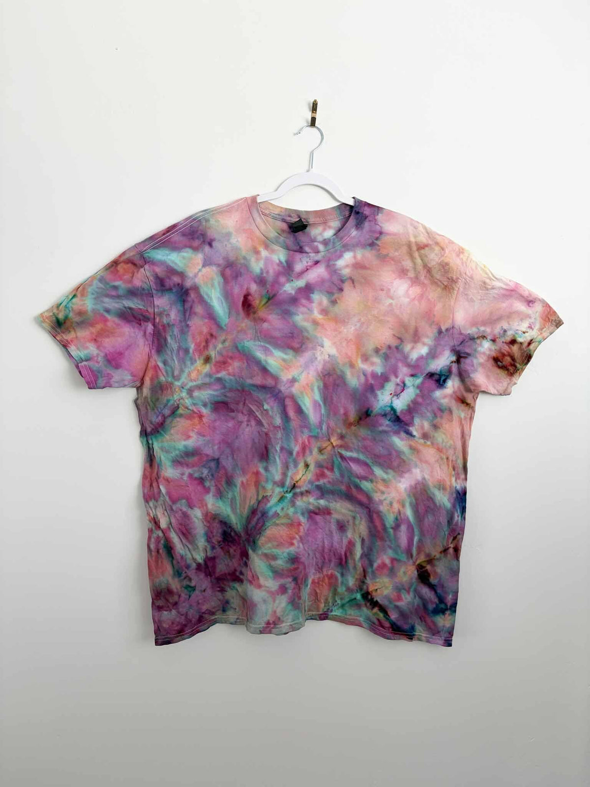 3XL pink and purple fern fold ice dye tie dye tee hanging, back view, handmade one of a kind