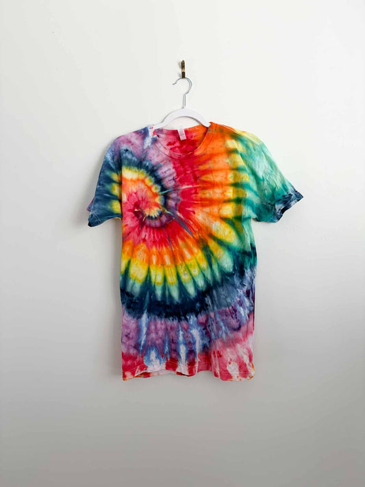 M rainbow spiral tie dye tee hanging, front view, handmade one of a kind