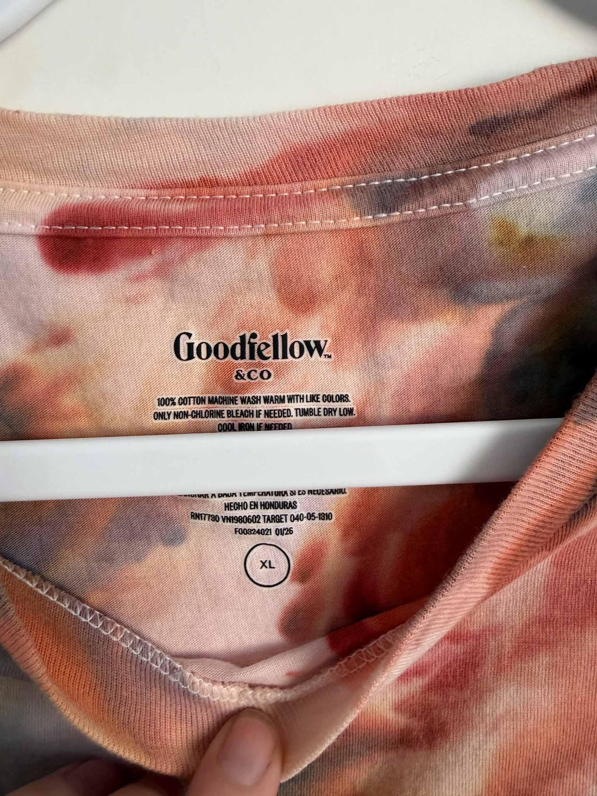 Goodfellow and Co size XL tag inside an ice dyed rust and blue t-shirt